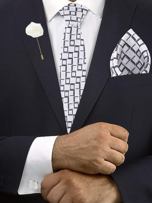 Kanthlangot white and black checkered tie set with silver cufflinks, pocket square, and white lapel pin. Premium men’s gift box for formal occasions.