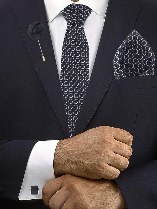 Make a statement with this 4-item Kanthlangot tie set featuring black circular pattern tie, square cufflinks, lapel pin, & pocket square in gift box.